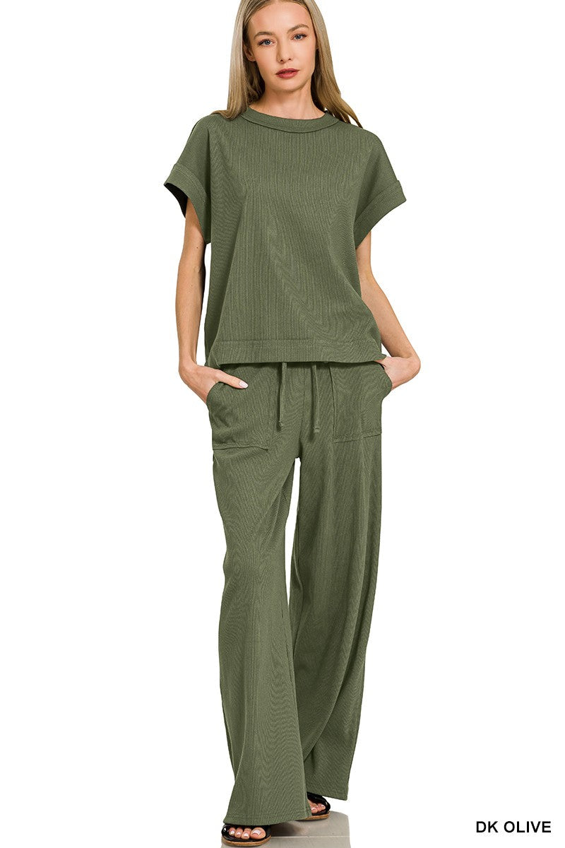 Women’s two-piece ribbed short sleeve tee and matching pants set made from a soft stretch cotton blend.