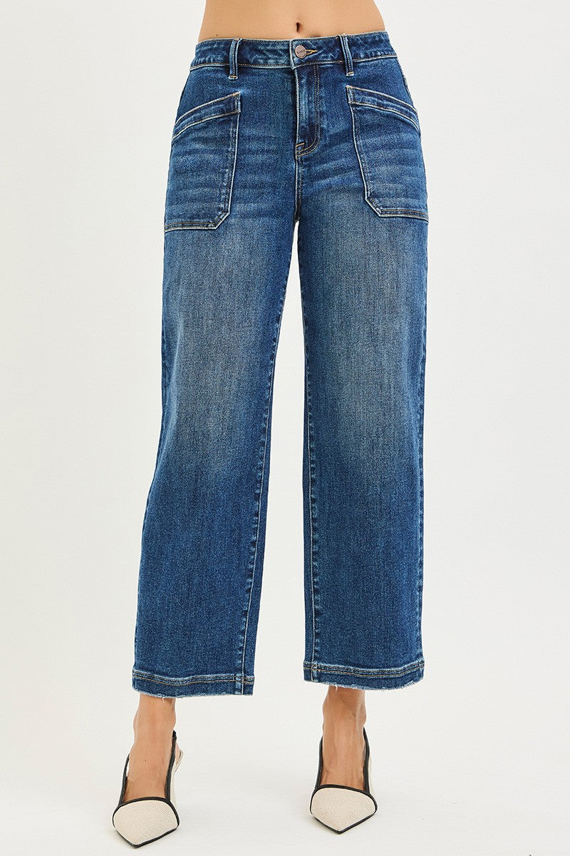 RISEN slouchy cropped baggy jeans with front patch pockets in medium wash denim.