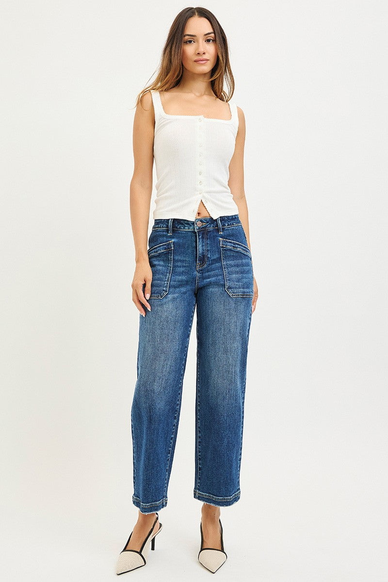 Model wearing RISEN high rise cropped baggy jeans in medium wash denim comfortable dark wash jeans 