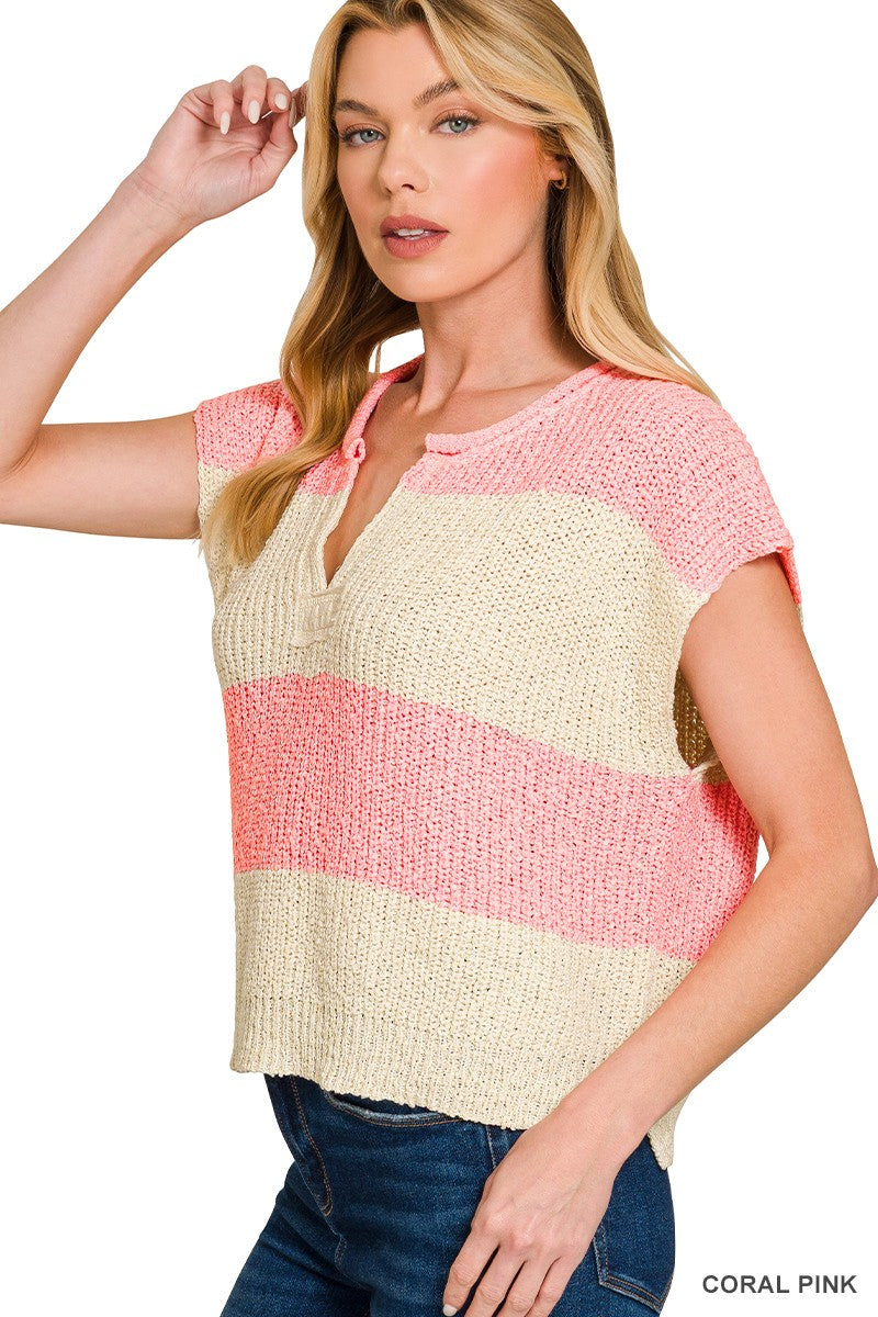 Coral Pink: Women’s coral pink and cream striped short sleeve knit sweater top with split neckline and textured relaxed fit.