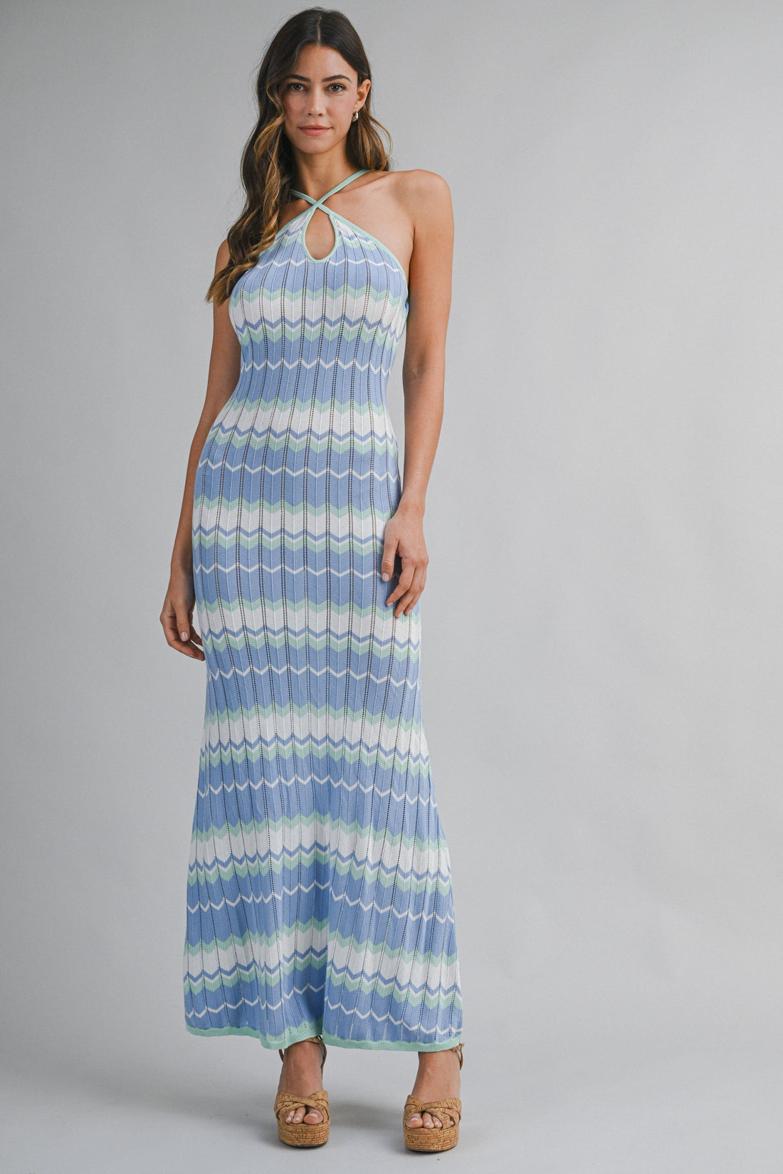 Women's blue halter knit bodycon maxi dress with coastal stripe pattern