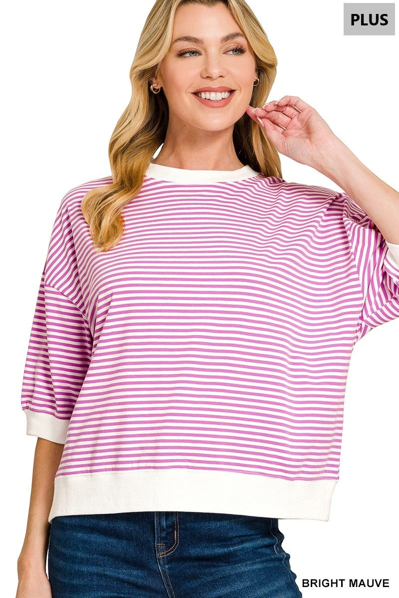 Women’s plus size striped top featuring contrast trim, ribbed banded detailing and soft stretch cotton fabric.