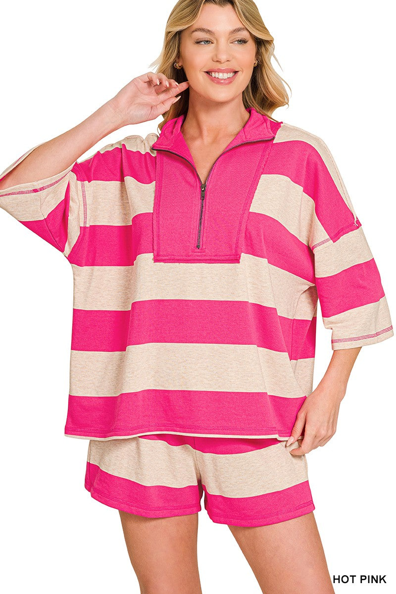 Women's hot pink striped French terry half zip lounge set with oversized top and elastic waist shorts.