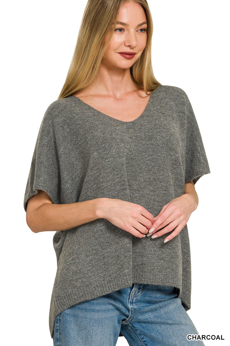 Charcoal lightweight sweater knit top featuring a flattering V-neckline and soft stretch fabric.