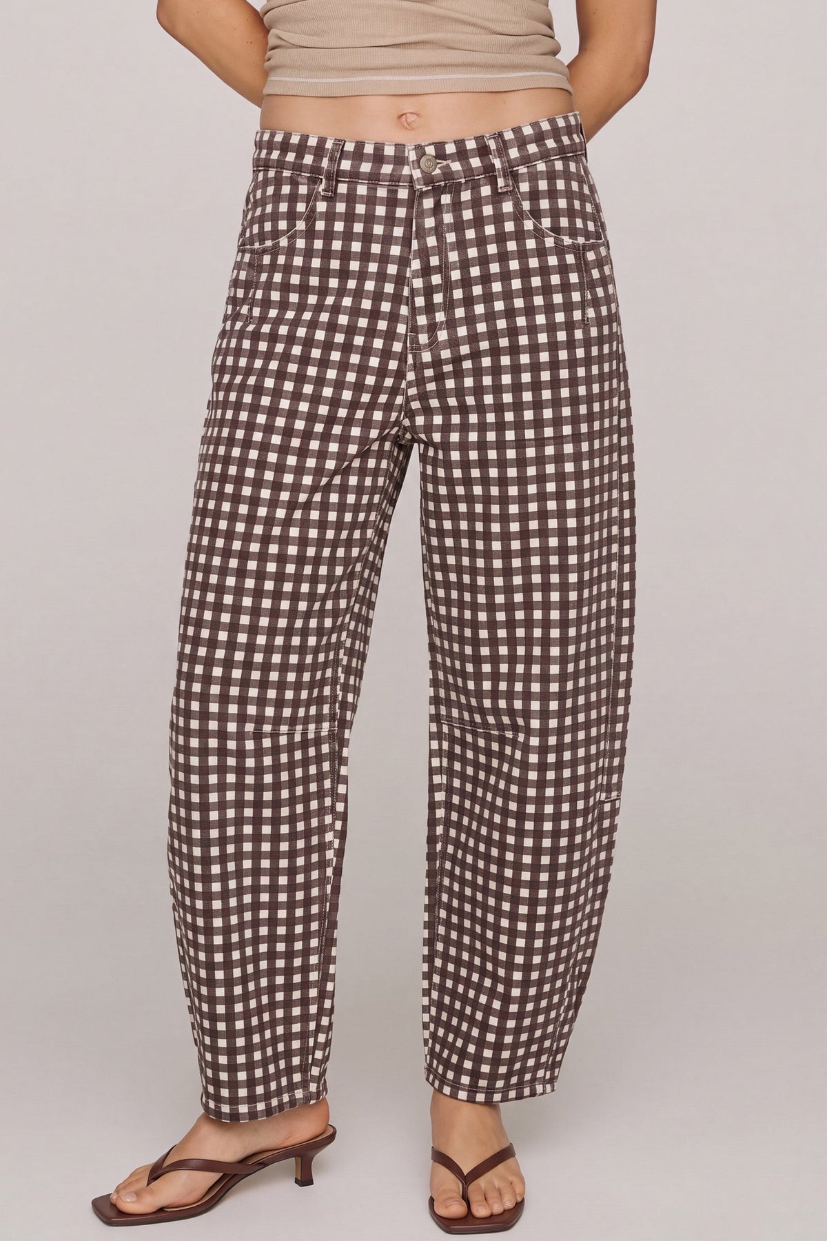 Women's chocolate brown and cream gingham barrel-leg pants by Peach Love California featuring a button closure, front pockets and ankle-length silhouette.