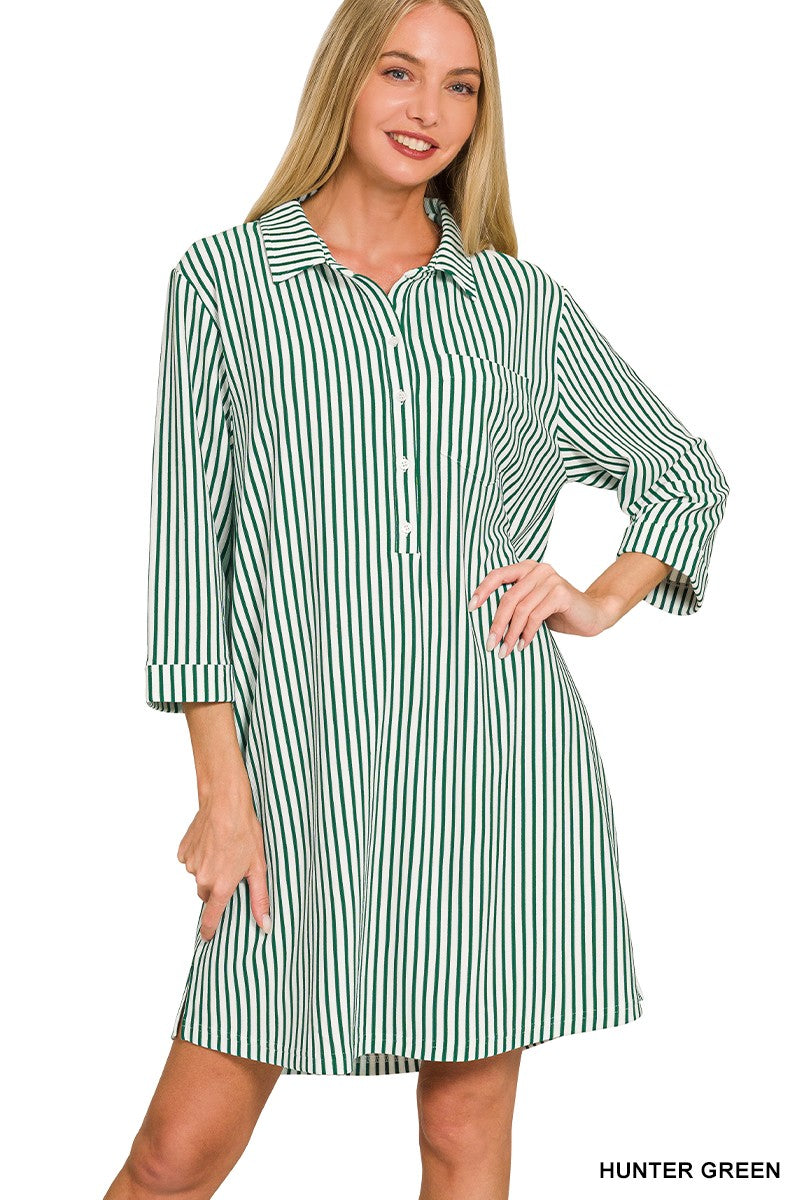 Women’s striped shirt dress featuring a collared neckline, half-button front and comfortable stretch fabric.
