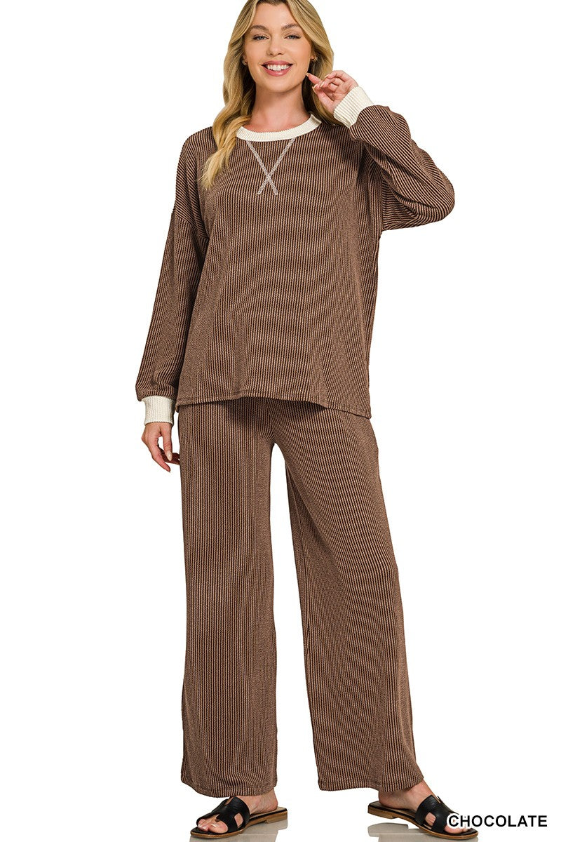 Women’s raised rib two-piece set featuring a round neck pullover and coordinating pants in a soft stretch fabric.
