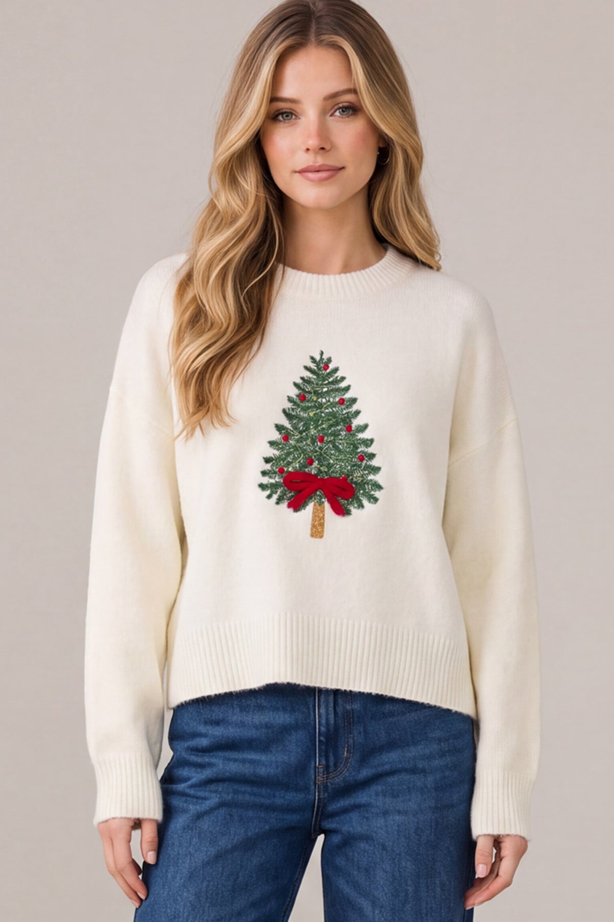 Cream Christmas sweater with embroidered green Christmas tree decorated with red ornaments and a red bow, round neckline, long sleeves