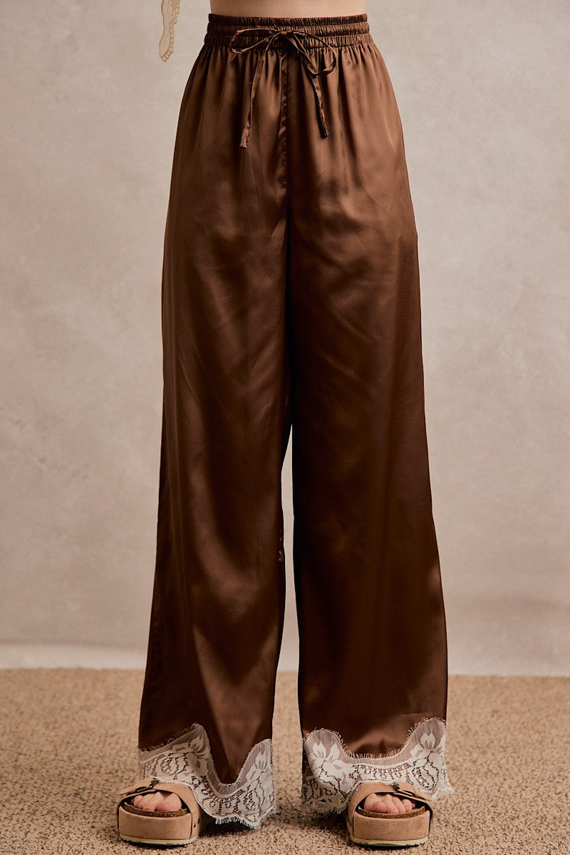 So Me women's satin wide-leg pants with delicate lace trim, a flowy silhouette and a comfortable elastic mid-rise waistband.