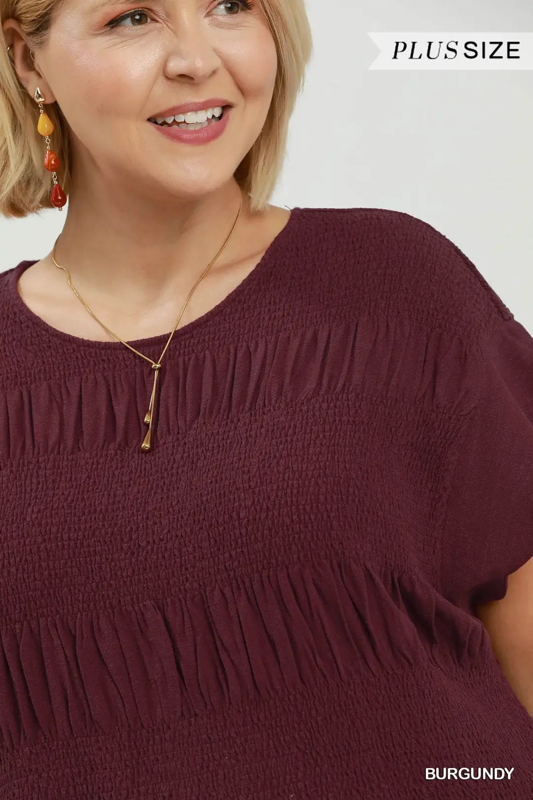 Cocoa Belle Smocked Peplum Top
