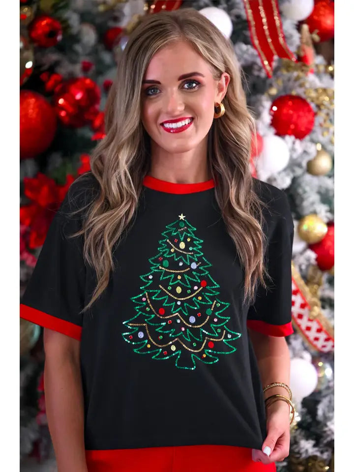 Close-up of the embellished Christmas tree design with decorative sequin accents on the Jess Lea holiday tee.