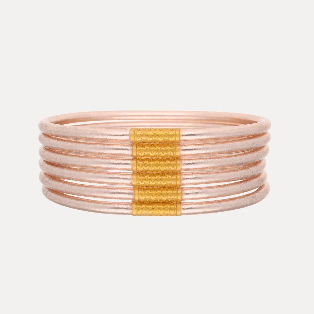 BuDhaGirl Champagne Lumine All Weather Bangles® set of six lightweight, flexible, waterproof stacking bangles in elegant champagne-inspired tones.