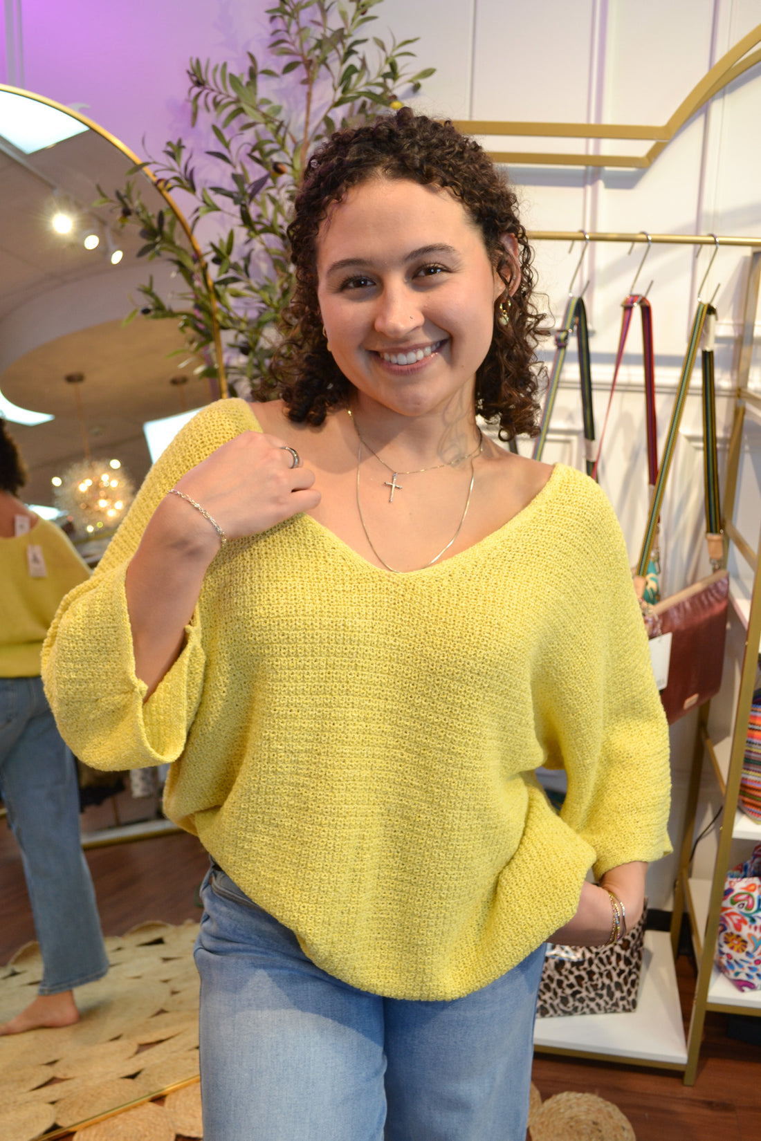 Butter yellow lightweight net sweater with a relaxed fit and wide neck line