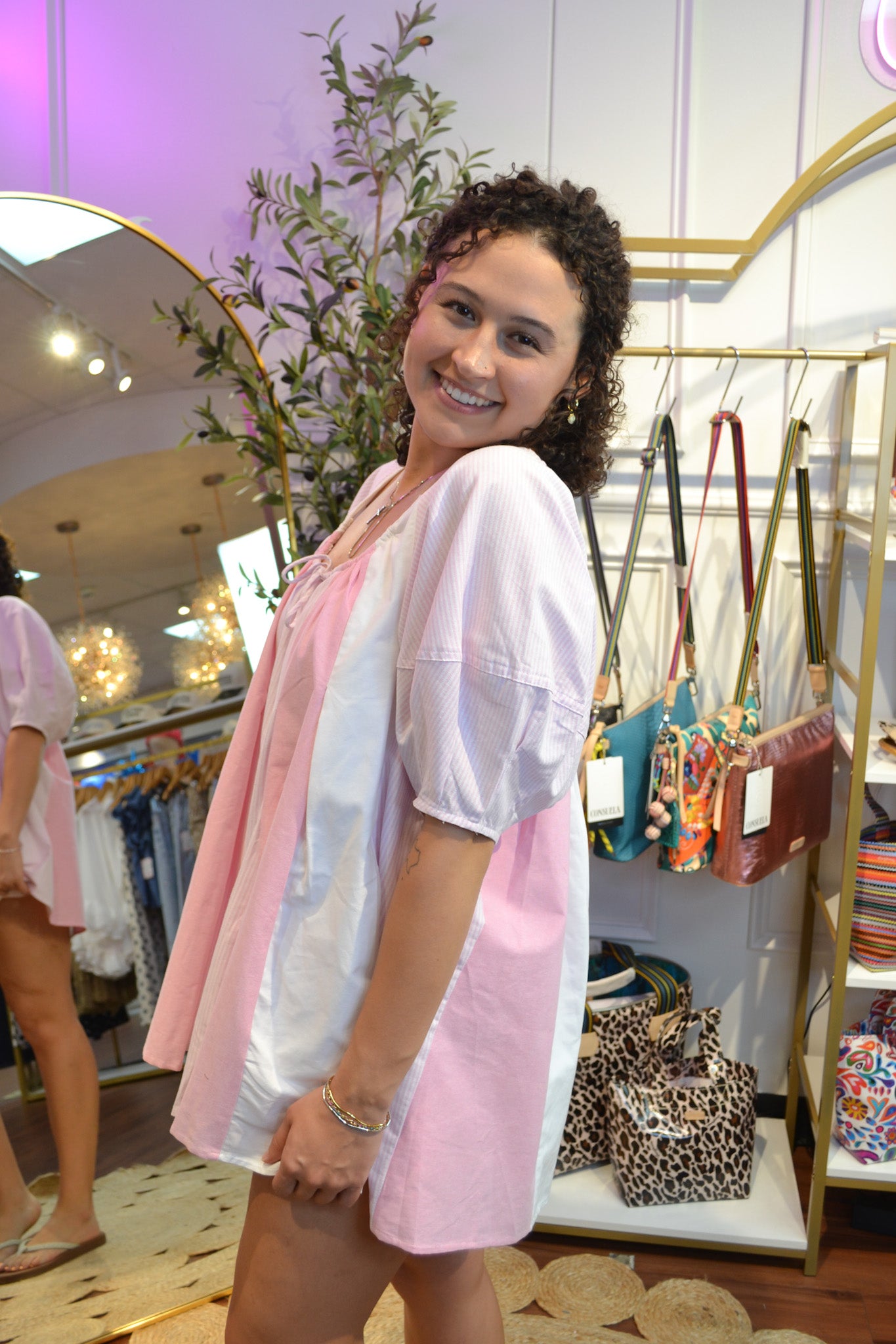     Lightweight pink romper with color block panels, perfect for spring and summer