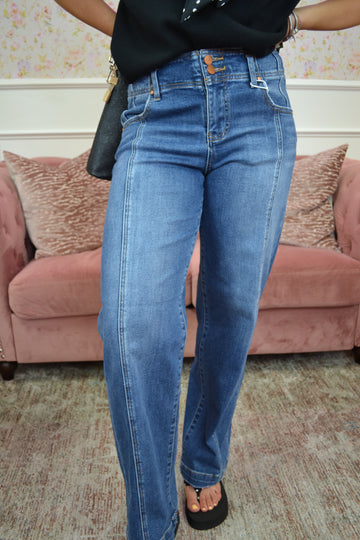 Classic medium wash high-rise straight-leg jeans featuring a flattering double-button waistband, stretch denim, and a timeless silhouette perfect for everyday wear.
