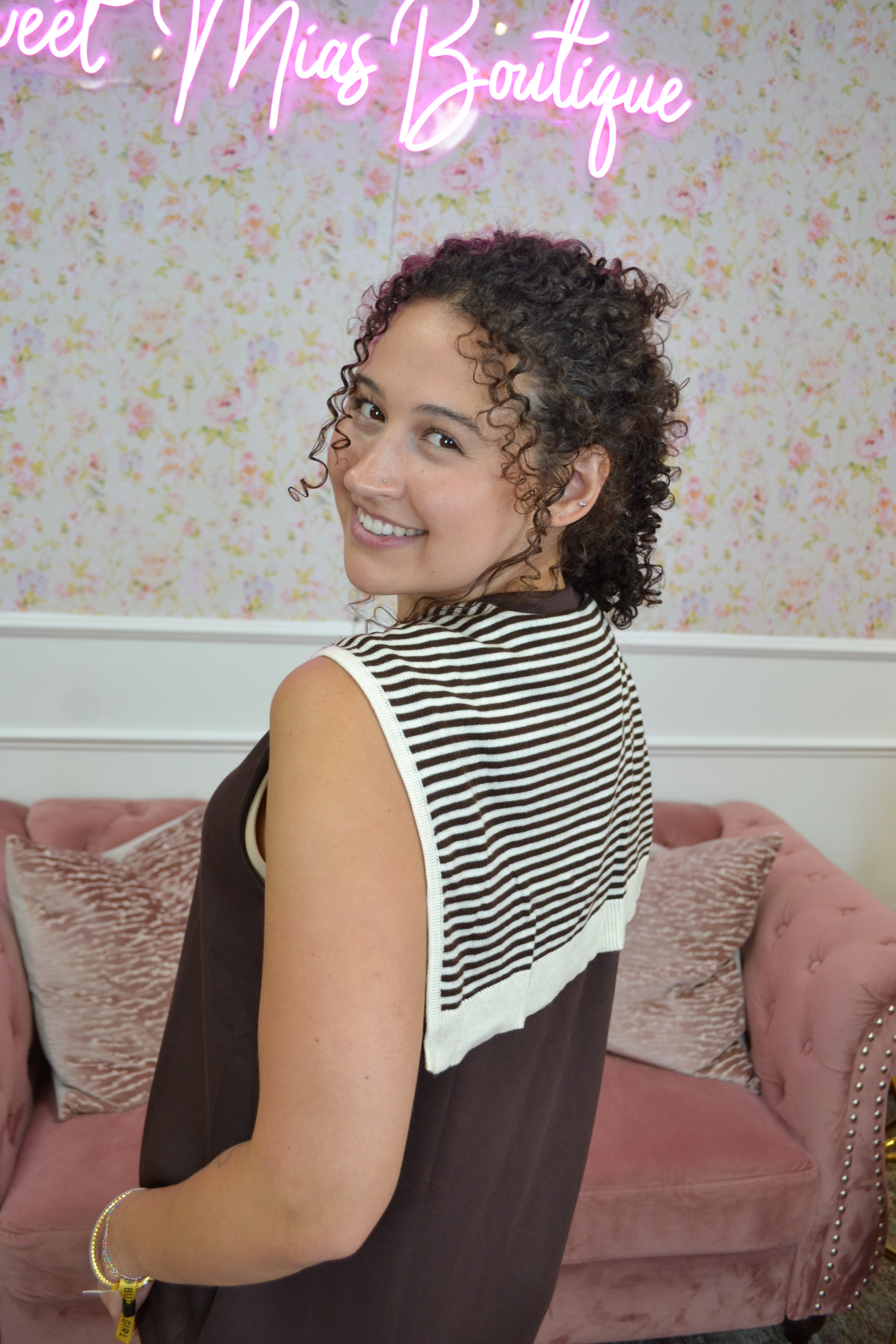 Women's comfortable sleeveless brown knit dress with attached striped shoulder sweater.