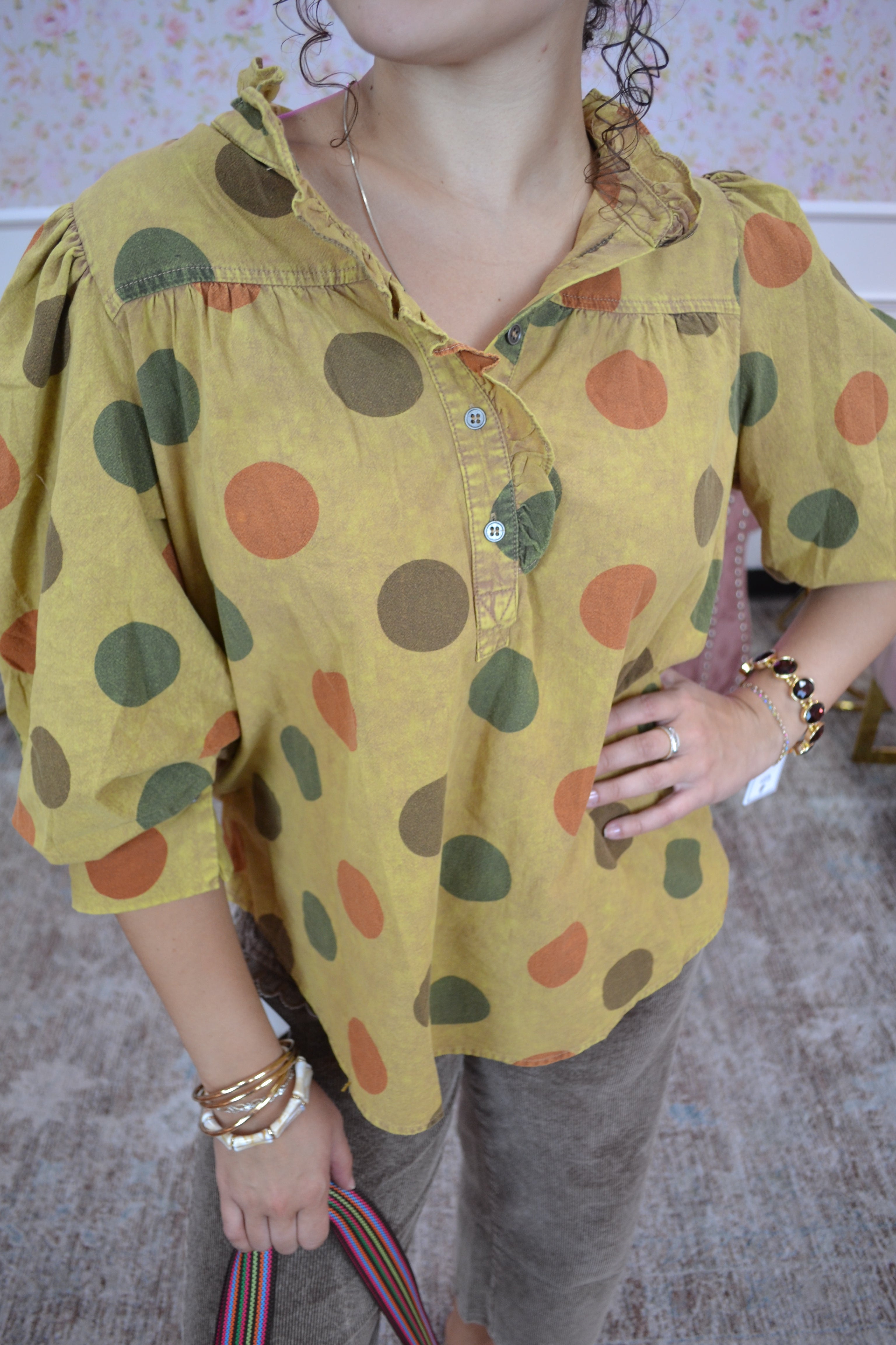 Trendy women's fall blouse with earthy polka dot print and puff sleeves