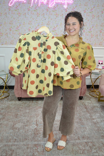 Women's olive and rust polka dot lightweight blouse with button front detail