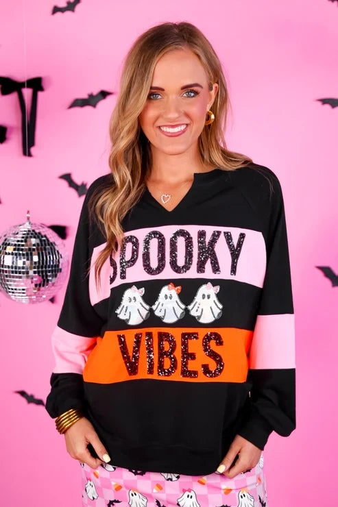 Jess Lea GiGi Spooky Vibes Halloween pullover featuring sparkling sequin lettering, foil ghost patches, long sleeves and a split neckline.