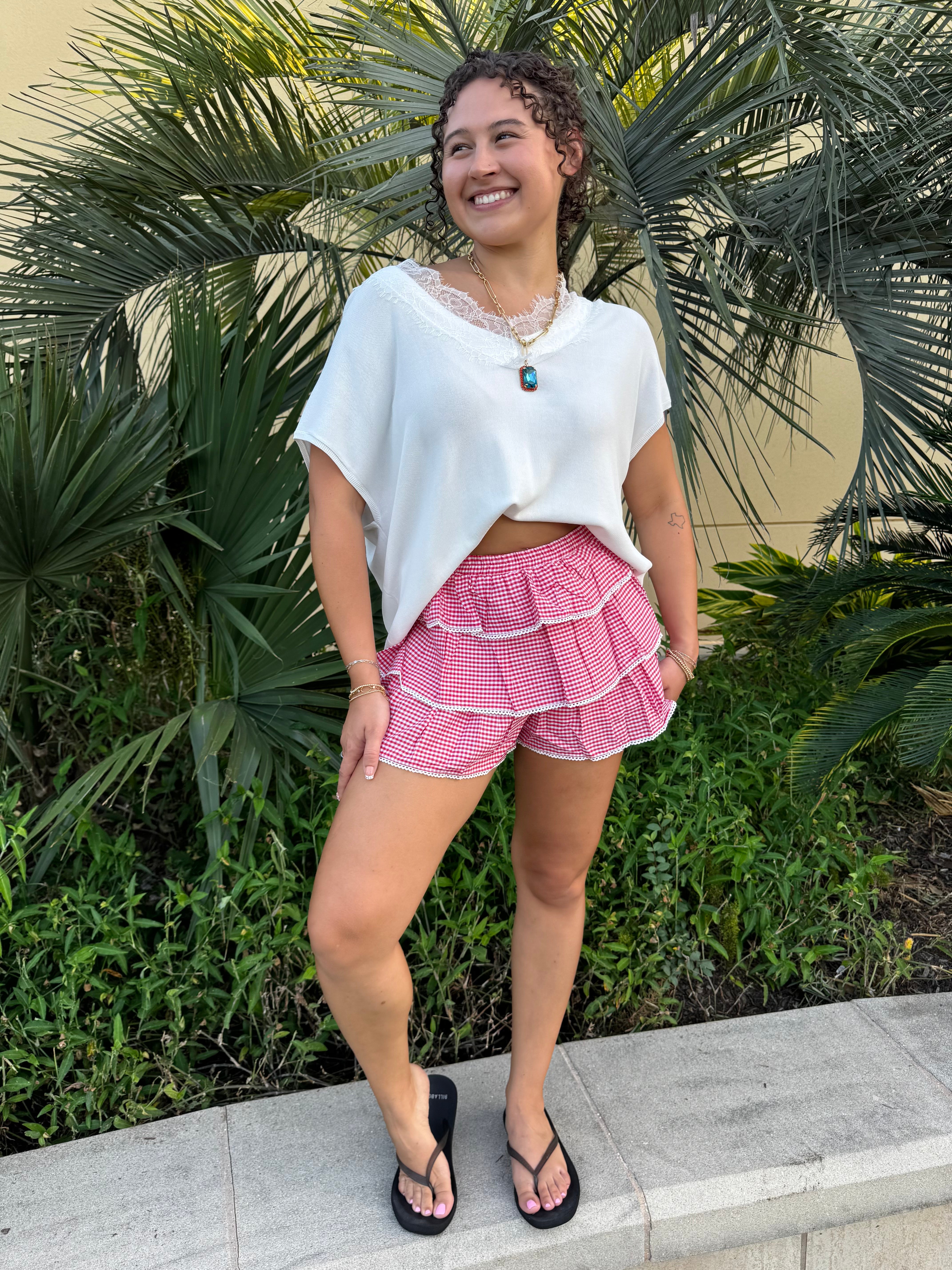 Red and white ruffle shorts with waistband detailing 