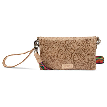 Beige leather crossbody bag with embossed floral pattern, multicolor striped strap, silver hardware, and Consuela logo patch, perfect for casual use.