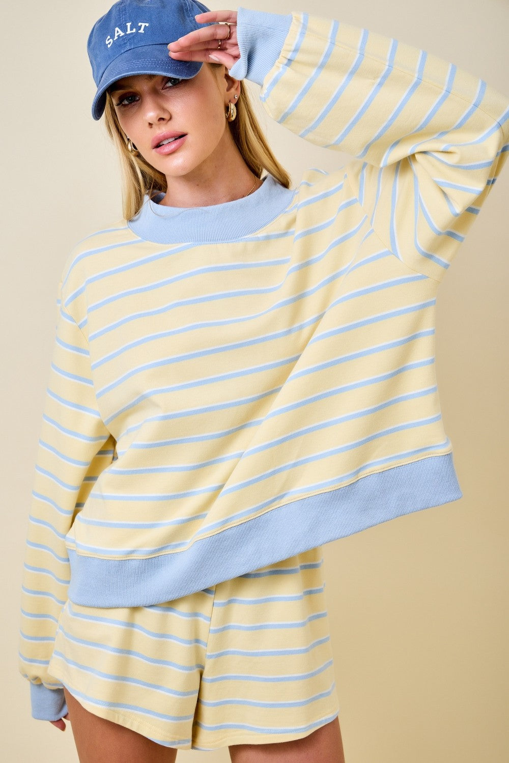 Women’s butter yellow and baby blue striped long sleeve top with contrast blue ribbed neckline, cuffs and hem.