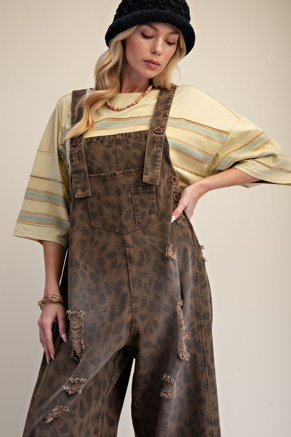 Leopard overalls with distressing detailing and adjustable straps 