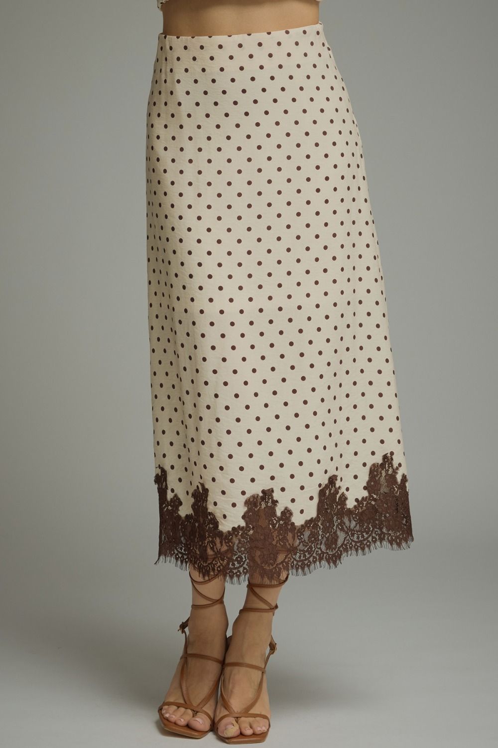 Women's cream polka dot midi skirt with brown lace hem