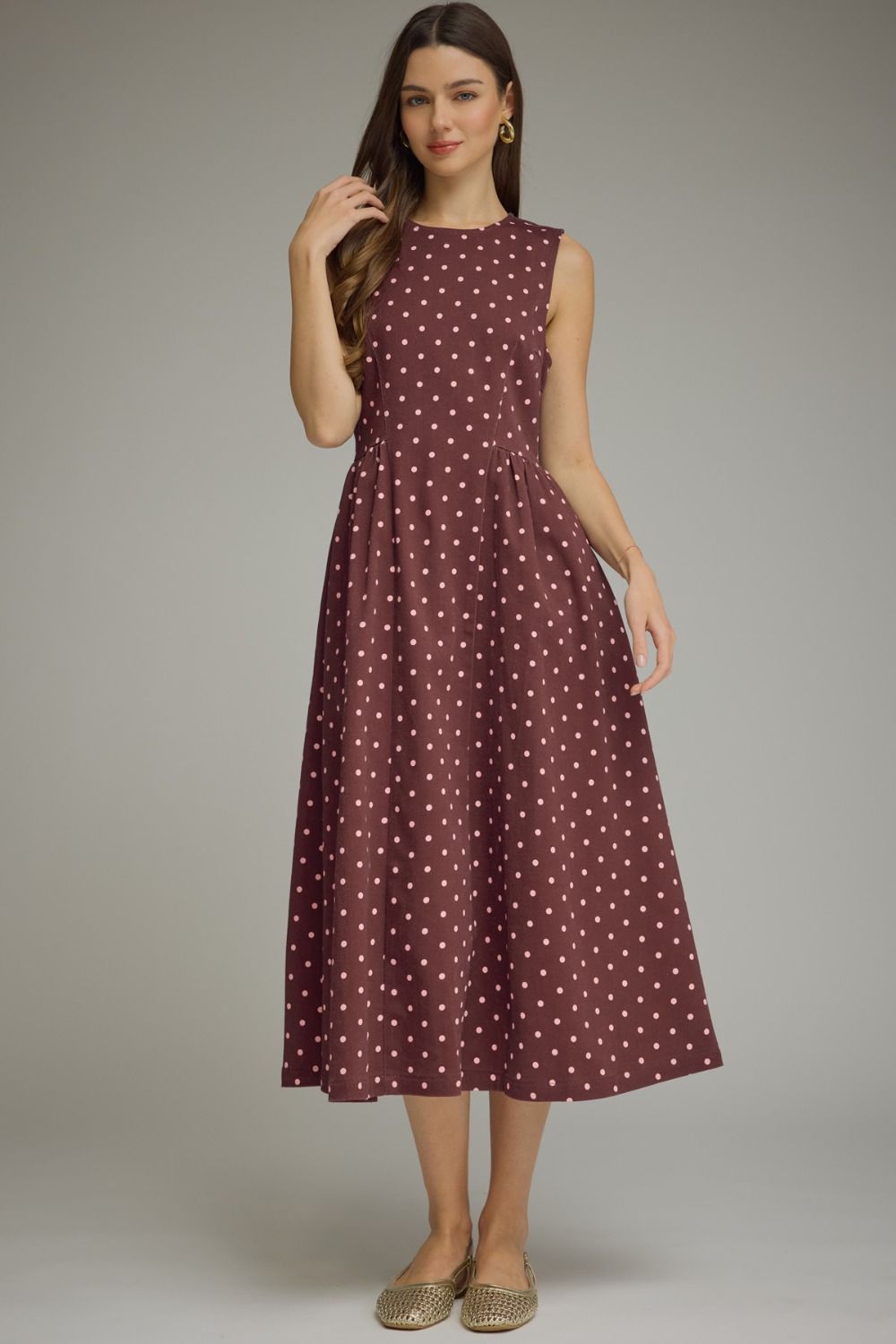 Brown polka dot sleeveless midi dress with side pockets