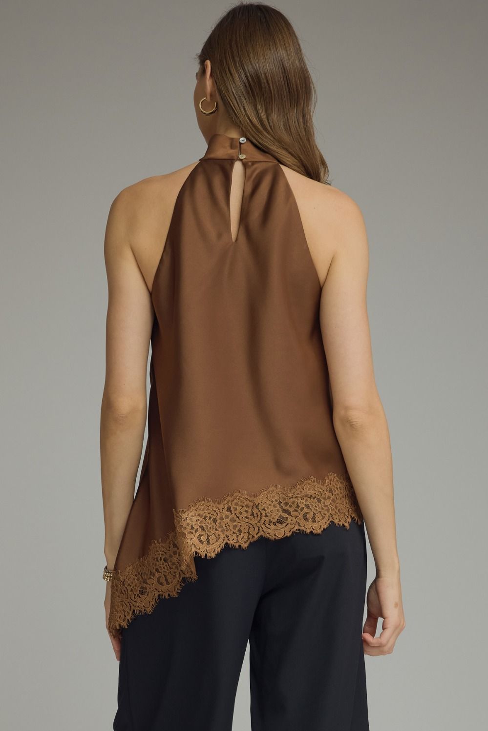 Women’s satin high neck top with feminine lace trim and flowy silhouette, available in black, chocolate brown, and burgundy.