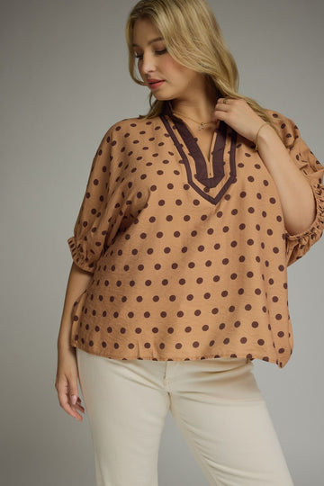 Brown top with chocolate brown polka dot with a v neck neckline 