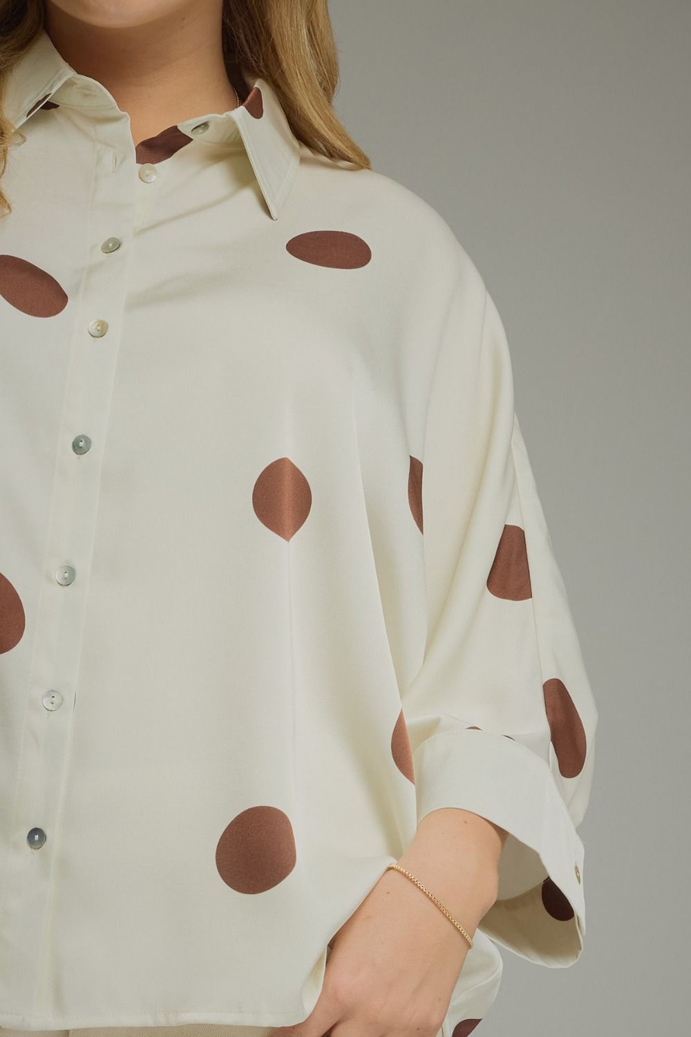 Cream plus size blouse with brown polka dots and 3/4 sleeves