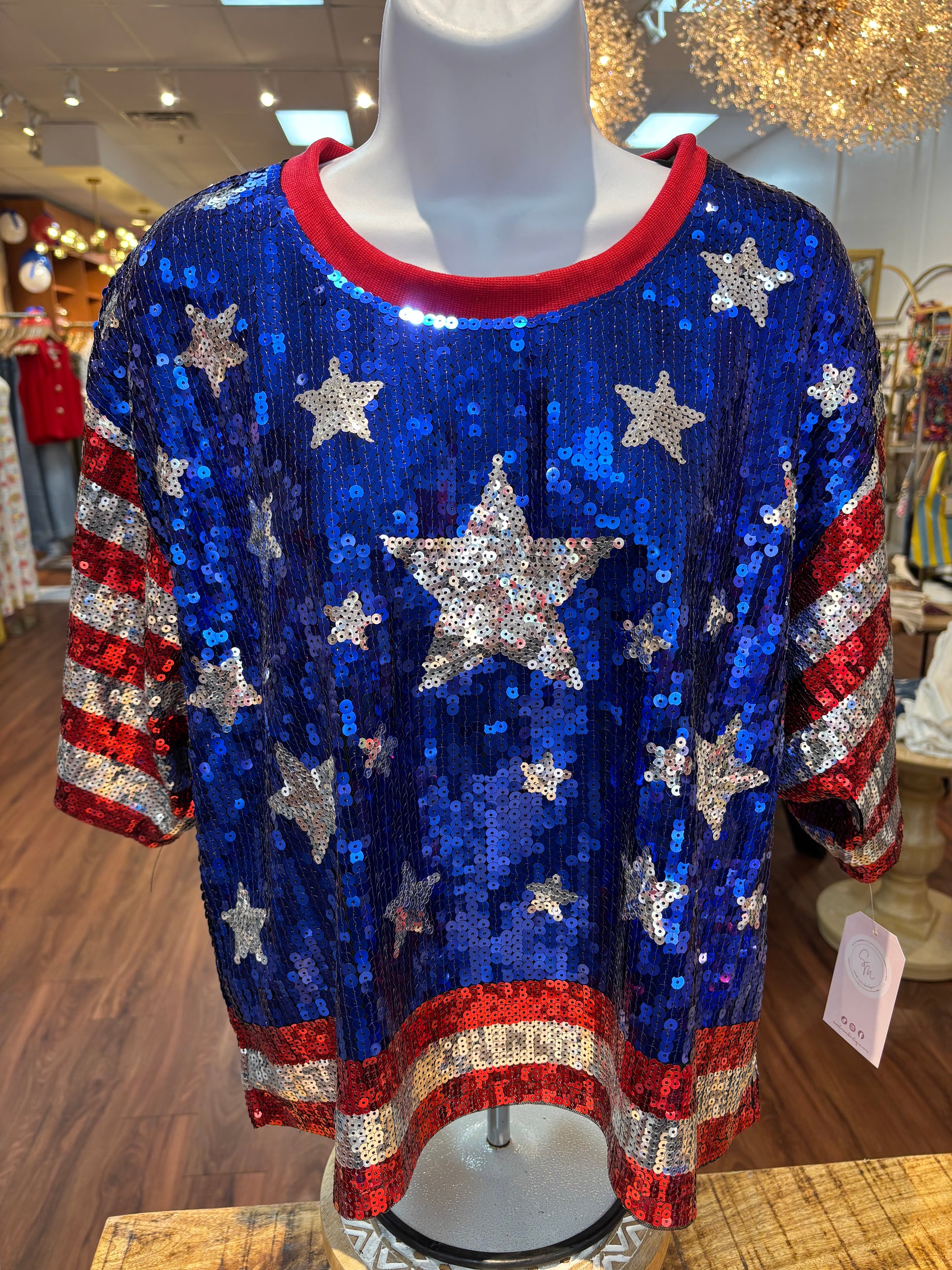 Red, silver, and blue sequin top