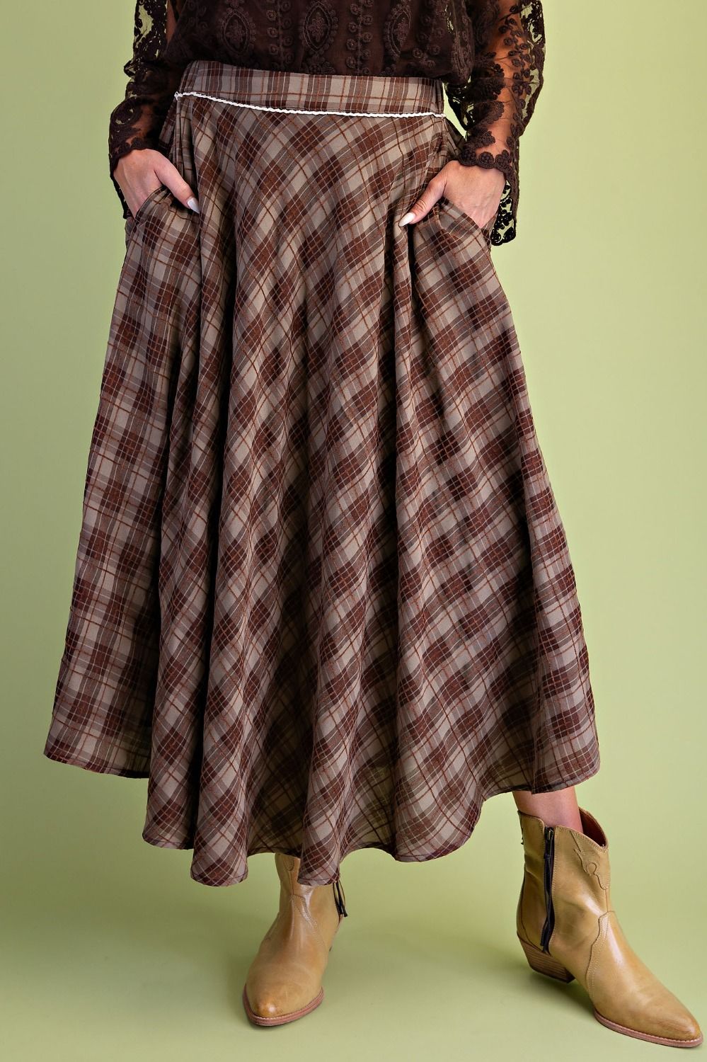 Brown and taupe plaid high waist flowy maxi skirt with side pockets and relaxed swing silhouette.